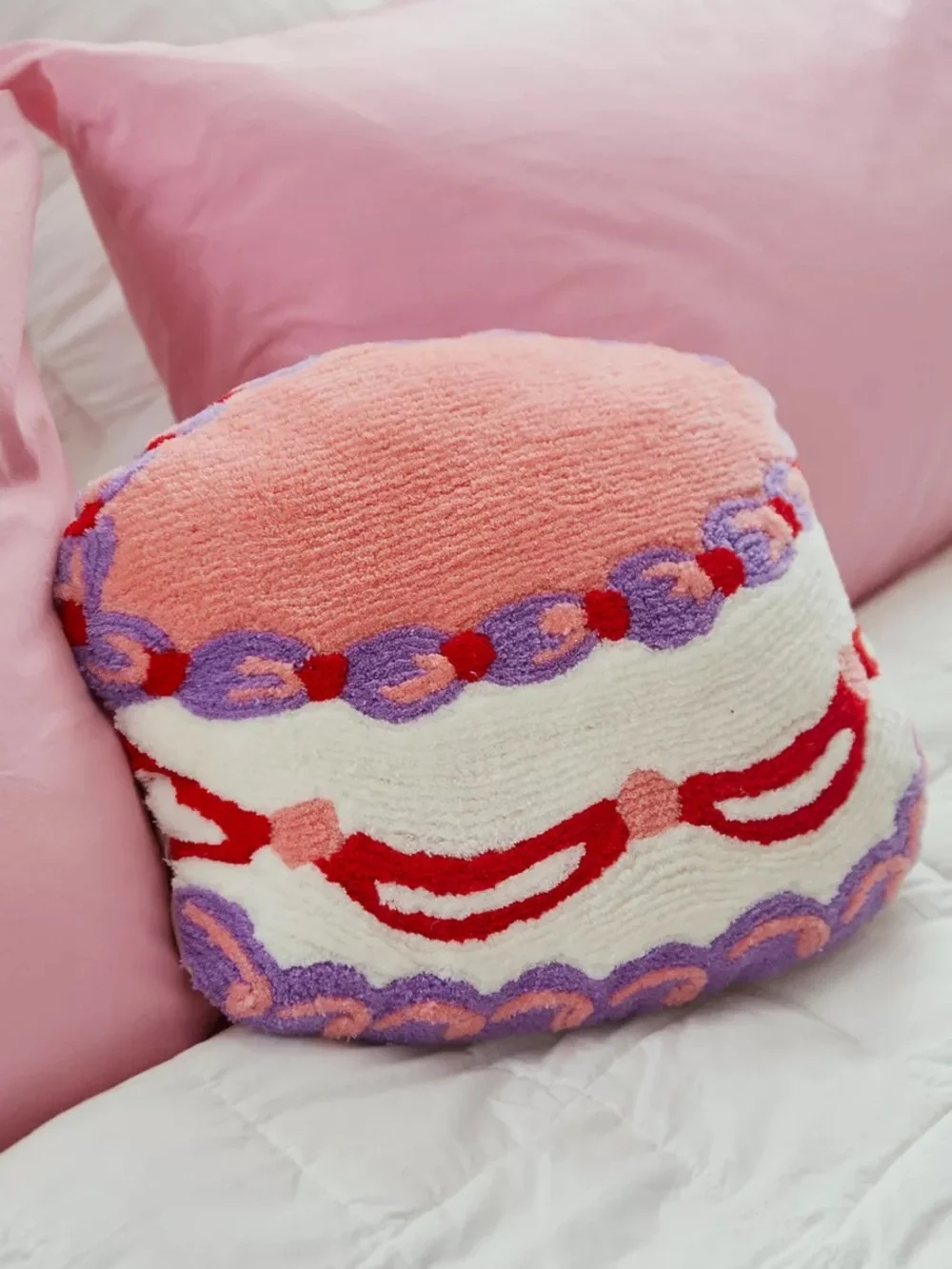 Urban Outfitters • Cake Tufted Throw Pillow
